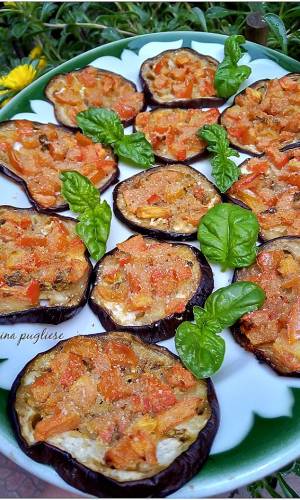 Melanzane gratinate con pomodorini